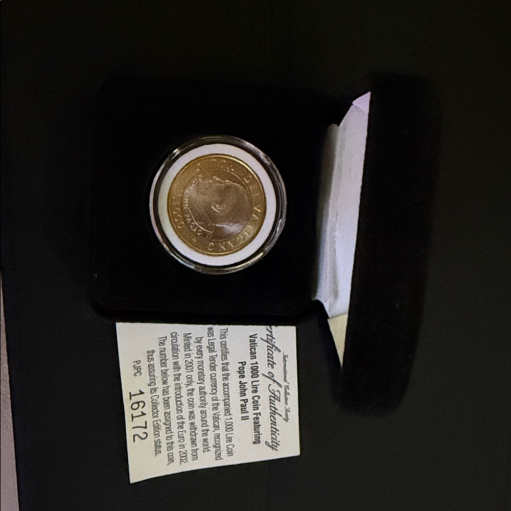 Elegant Gold Coin in Black Display Case
